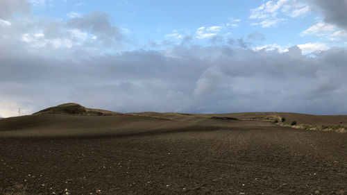 Scenic view of desert against sky