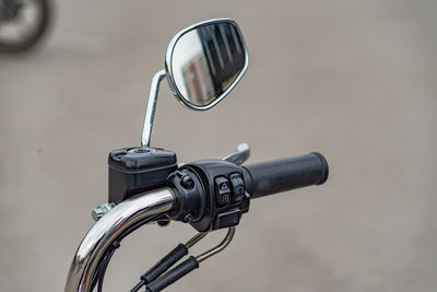 Motorcycle handlebar with chrome rear view mirror