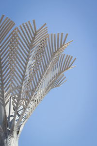 Low angle view of building against blue sky