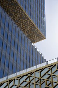 Low angle view of modern building against sky