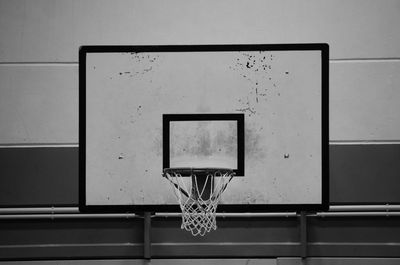 Low angle view of basketball hoop against wall