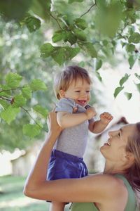 Side view of a mother and woman