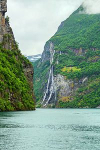 Geiranger fjord, norway, landscape with mountains and waterfalls seven sisters at summertime