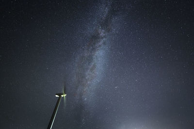 Low angle view of star field against sky at night, milky way. 