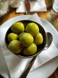 High angle view of fruits in plate on table
