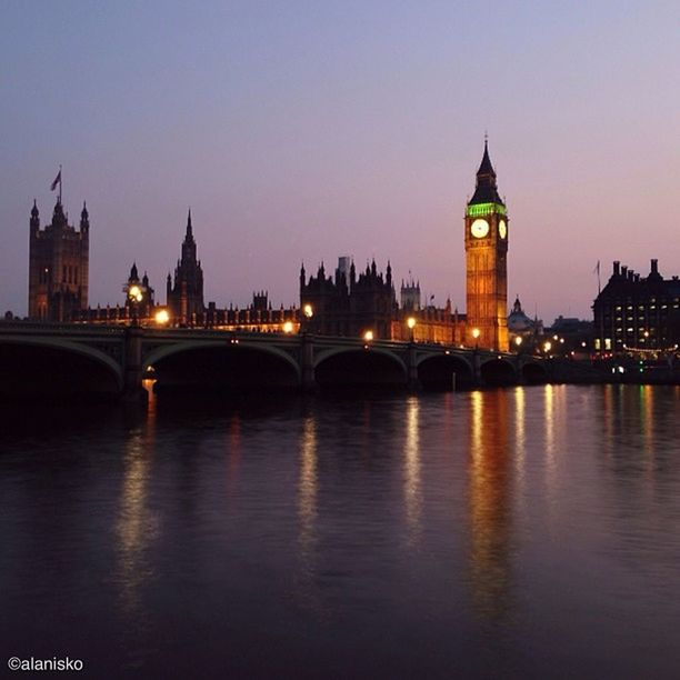 architecture, built structure, illuminated, river, connection, building exterior, water, bridge - man made structure, waterfront, reflection, city, clear sky, travel destinations, famous place, night, bridge, international landmark, tourism, travel, capital cities