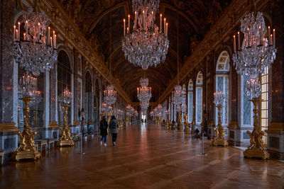 Group of people in illuminated building