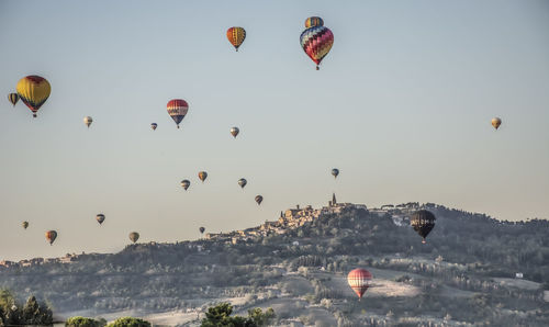 Low angle view of hot air balloons against sky