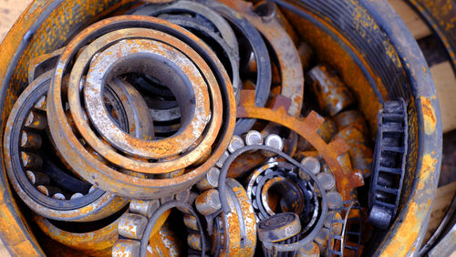 Close-up of rusty machine part of car