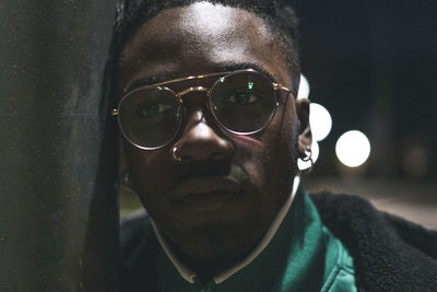 Close-up portrait of man wearing sunglasses