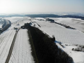 High angle view of snow field against sky