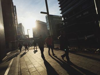 Sun shining through city