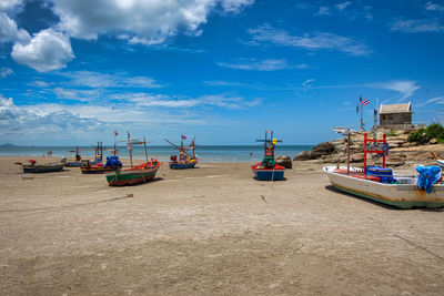 Local fishing boat on the beach in prachuap khiri khan thailand