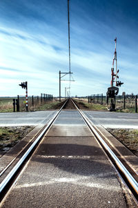 Railroad tracks against sky