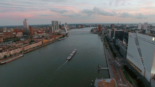 High angle view of river amidst buildings in city