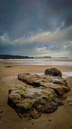 Scenic view of beach against sky