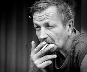 Close-up of man smoking cigarette