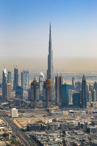 Modern buildings in city against sky