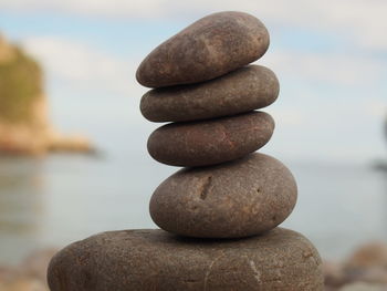 Close-up of stone stack on rock