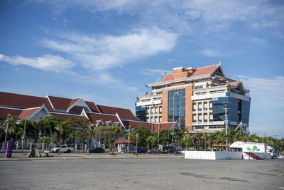 Buildings in city against sky