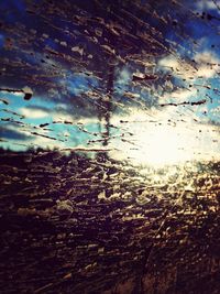 Full frame shot of airplane window against sky