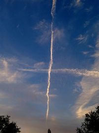 Low angle view of vapor trail in sky