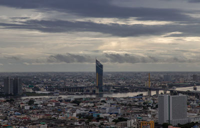 Cityscape against sky during sunset