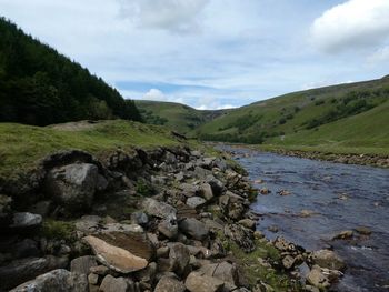 Scenic view of river against sky