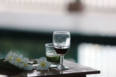 Close-up of wine glass on table