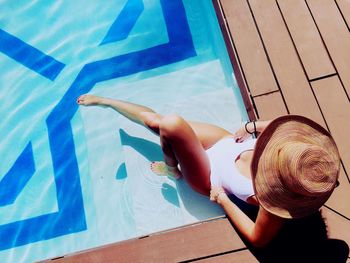 Man swimming in pool