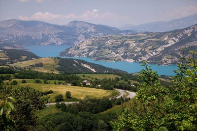 Scenic view of landscape and mountains against sky