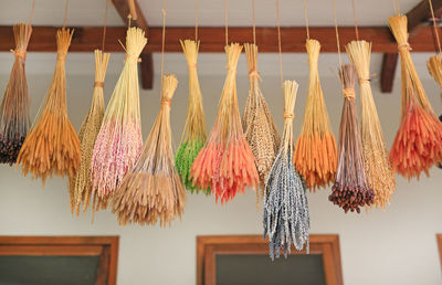 Low angle view of decorations hanging on ceiling in building