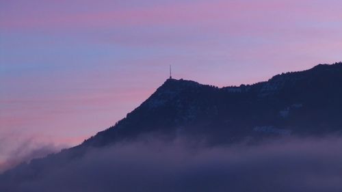 Scenic view of mountain against sky during sunset