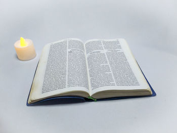 High angle view of open book on table