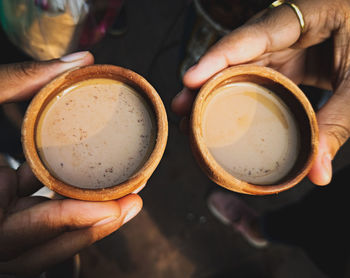 Close-up of hand holding drink