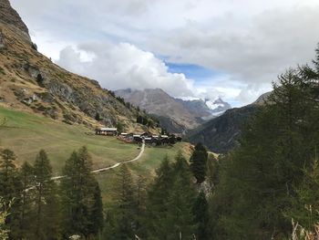 Scenic view of landscape and mountains against sky