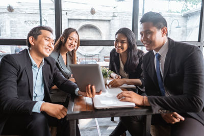 Business colleagues working on table