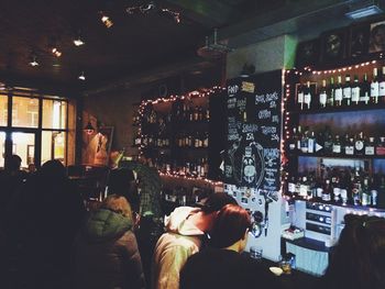 Man in illuminated room