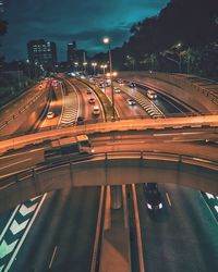 High angle view of cars on road at night