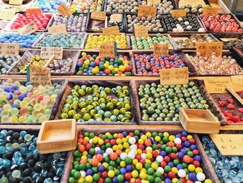 High angle view of multi colored vegetables for sale in market