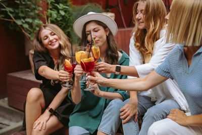 Woman sitting in friends