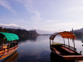 Calm lake with mountains in background