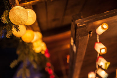 Close-up of illuminated lantern hanging at night