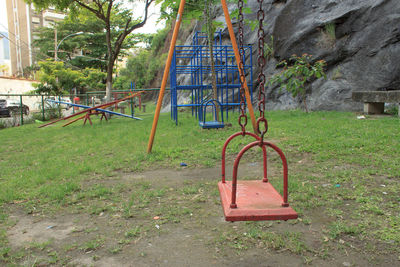 Empty swing in park