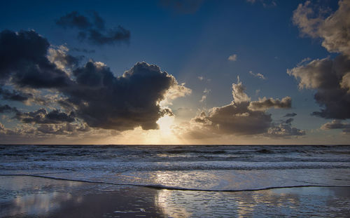 Scenic view of sea against sky during sunset