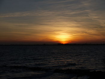 Scenic view of sea against sky during sunset