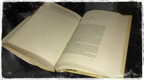 High angle view of open book on table