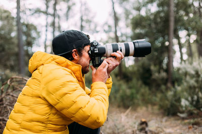 Man photographing with camera