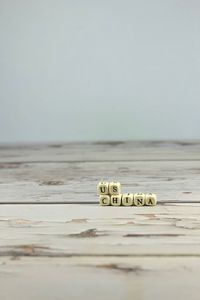 Close-up of coins on table