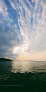 Scenic view of sea against sky at sunset